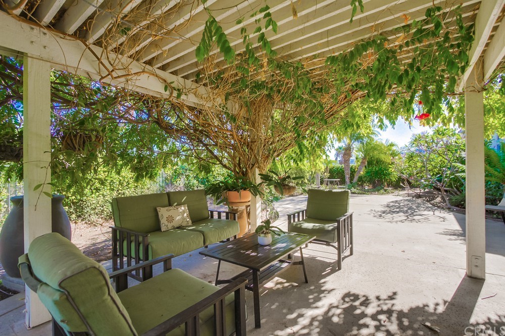 3036 Southwind Lane Vista, CA 92084 - Photo 7 of 45 a backyard of a house with outdoor seating