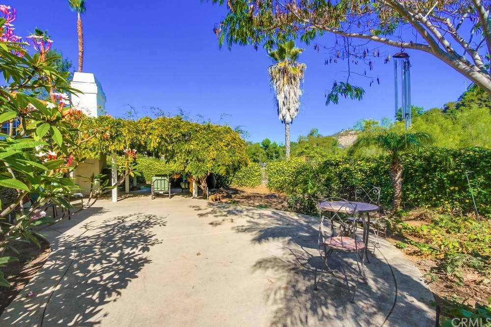 3036 Southwind Lane Vista, CA 92084 - Photo 9 of 45 a view of a bunch of flowers and trees