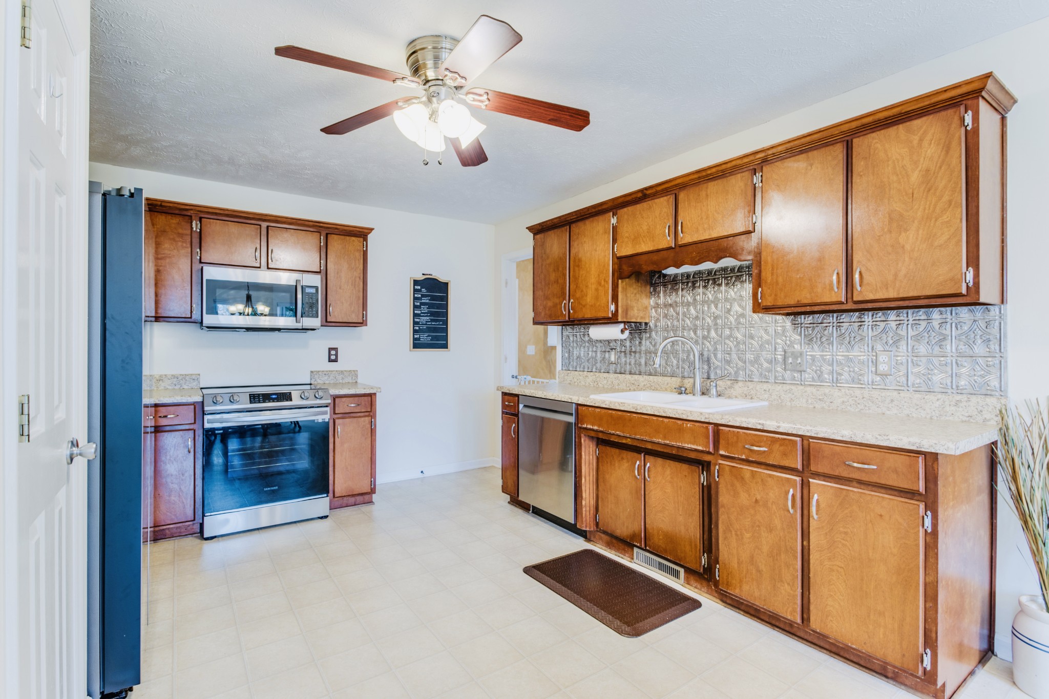 1482 Overton Court Rockvale, TN 37153 - Photo 17 of 58 a kitchen with stainless steel appliances granite countertop a stove sink and cabinets