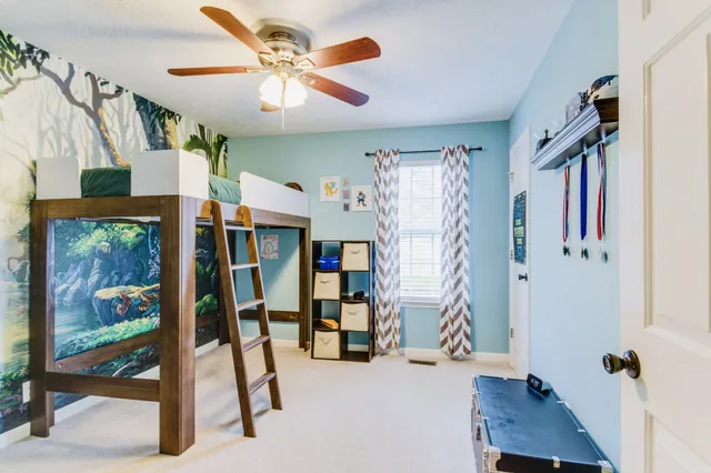 a bathroom with a sink vanity and a mirror