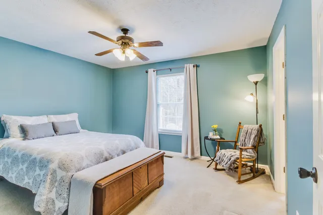 a view of a hallway with a washer and dryer
