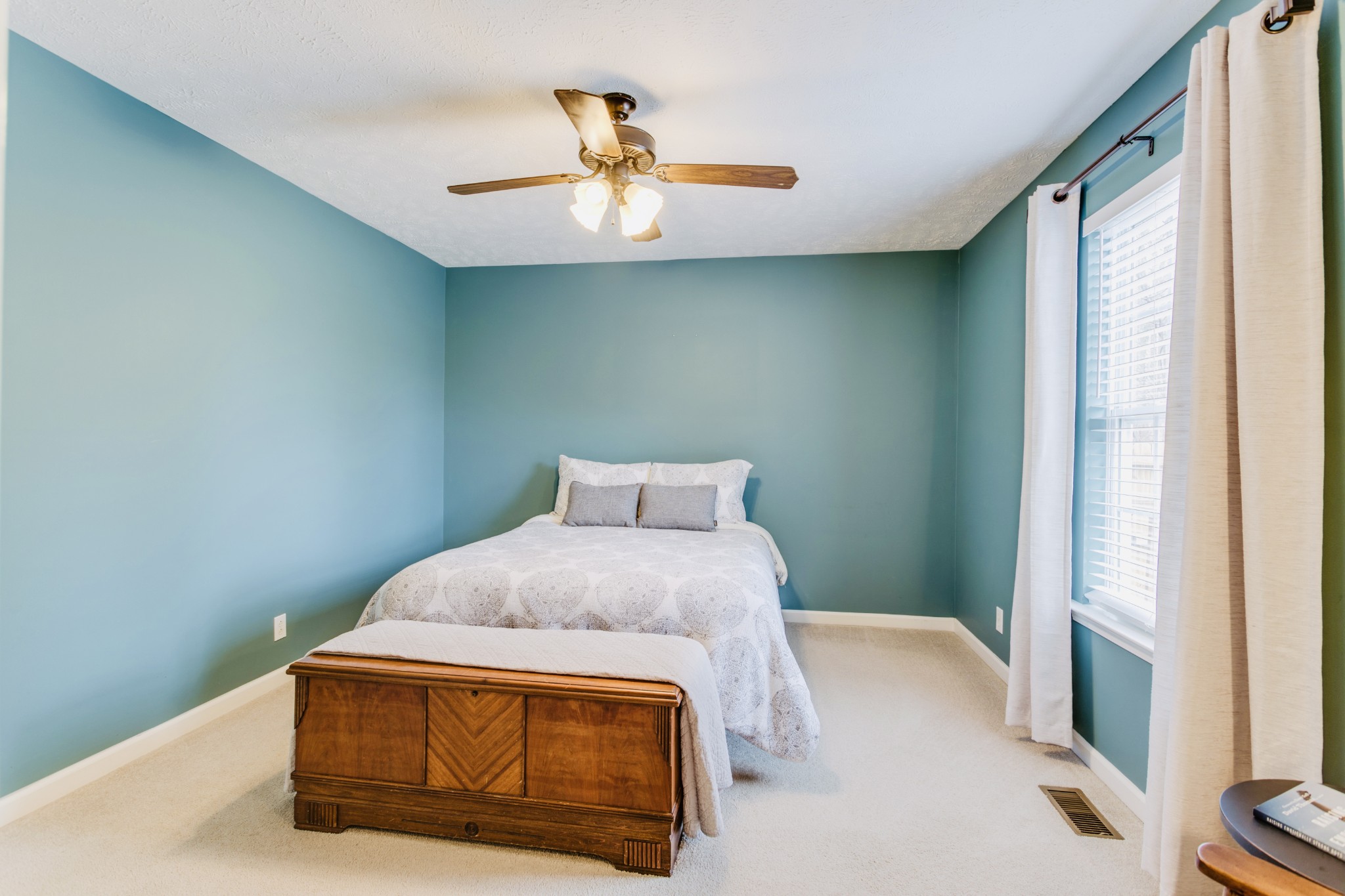 1482 Overton Court Rockvale, TN 37153 - Photo 30 of 58 a bedroom with a bed and a chandelier