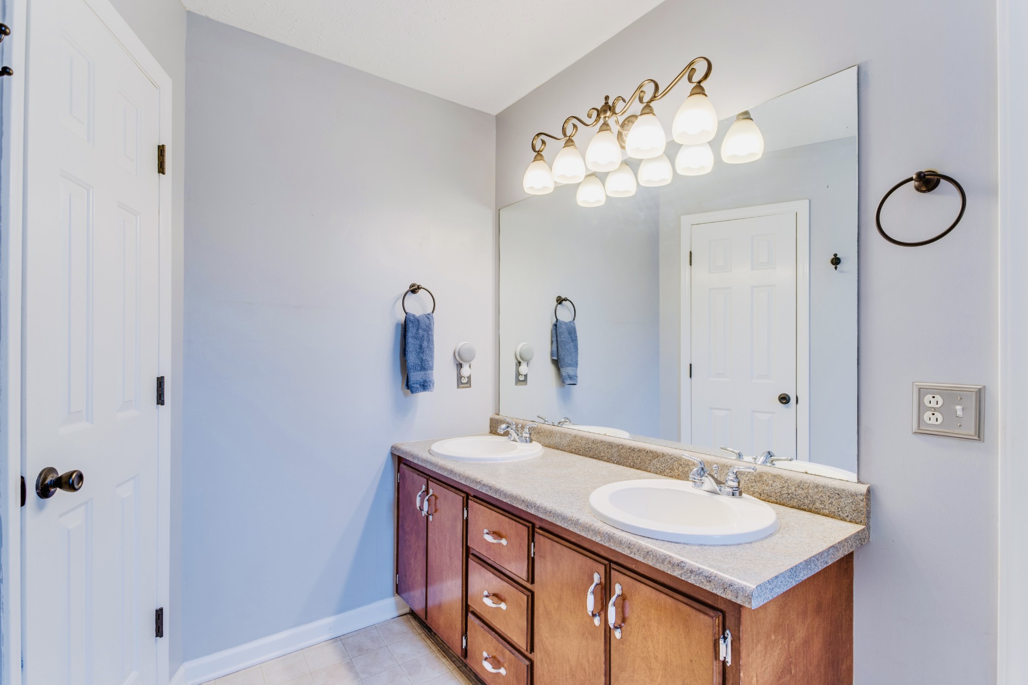 1482 Overton Court Rockvale, TN 37153 - Photo 33 of 58 a bathroom with a sink vanity and a mirror