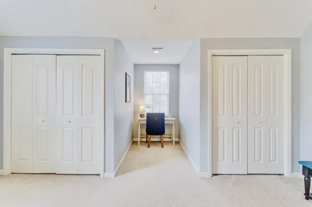 a view of a workspace with furniture