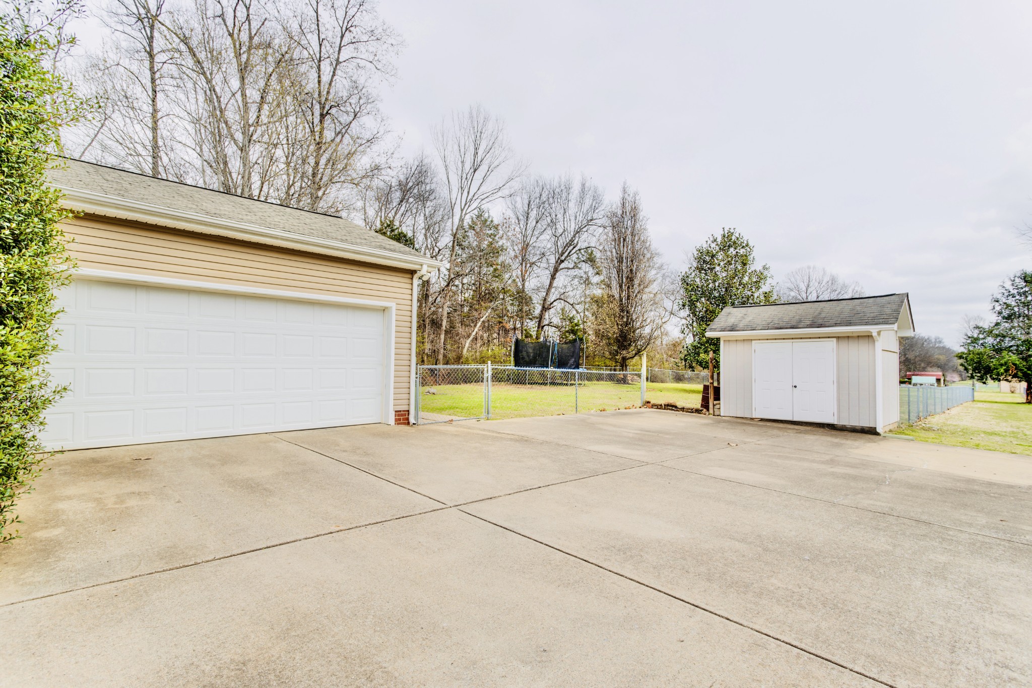 1482 Overton Court Rockvale, TN 37153 - Photo 45 of 58 a view of a house with a yard and a garage