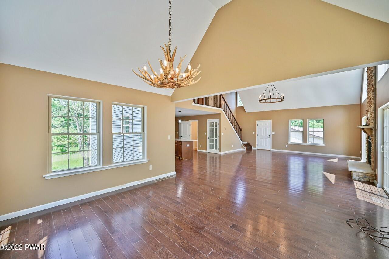 45 Rockway Road Lake Ariel, PA 18436 - Photo 25 of 65 a view of an empty room with wooden floor and a window