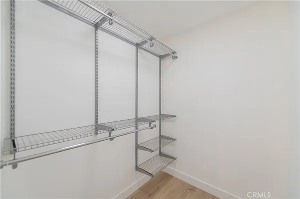 a bathroom with a shower and a sink
