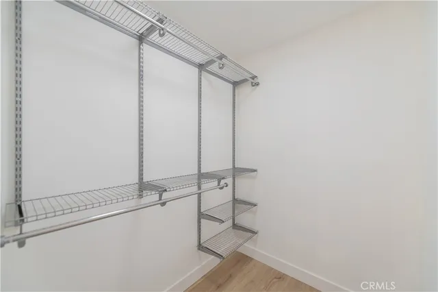 a bathroom with a shower and a sink