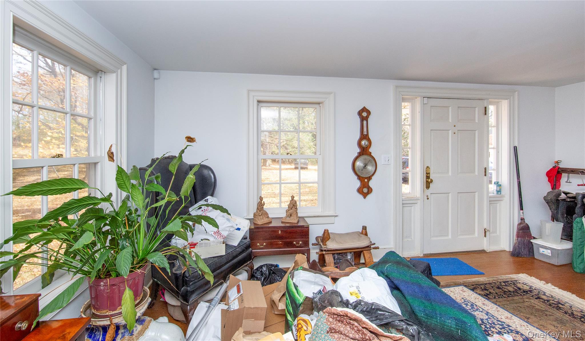 64 South Quaker Hill Road Pawling, NY 12564 - Photo 15 of 46 a living room with patio furniture and a potted plant