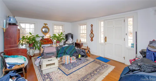 a bed room with furniture and a window