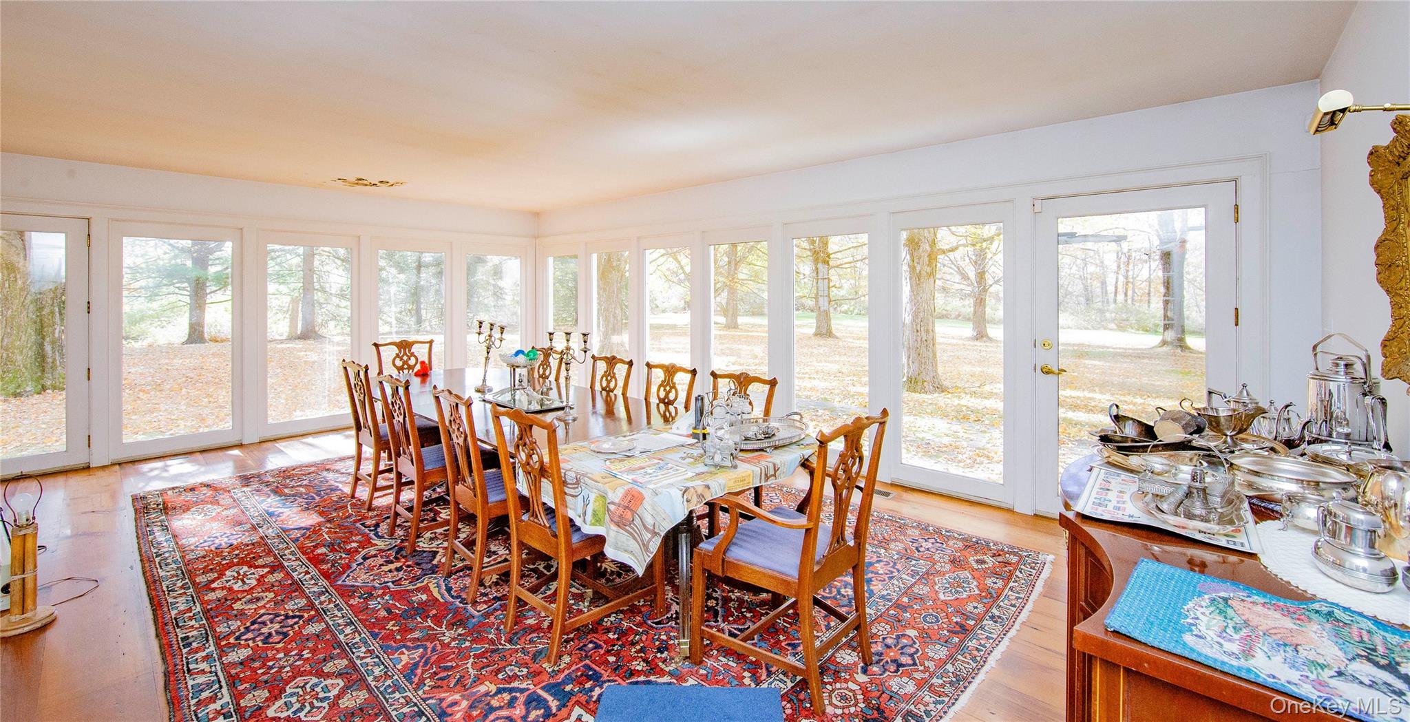 64 South Quaker Hill Road Pawling, NY 12564 - Photo 26 of 46 a view of a dining room with furniture window and wooden floor