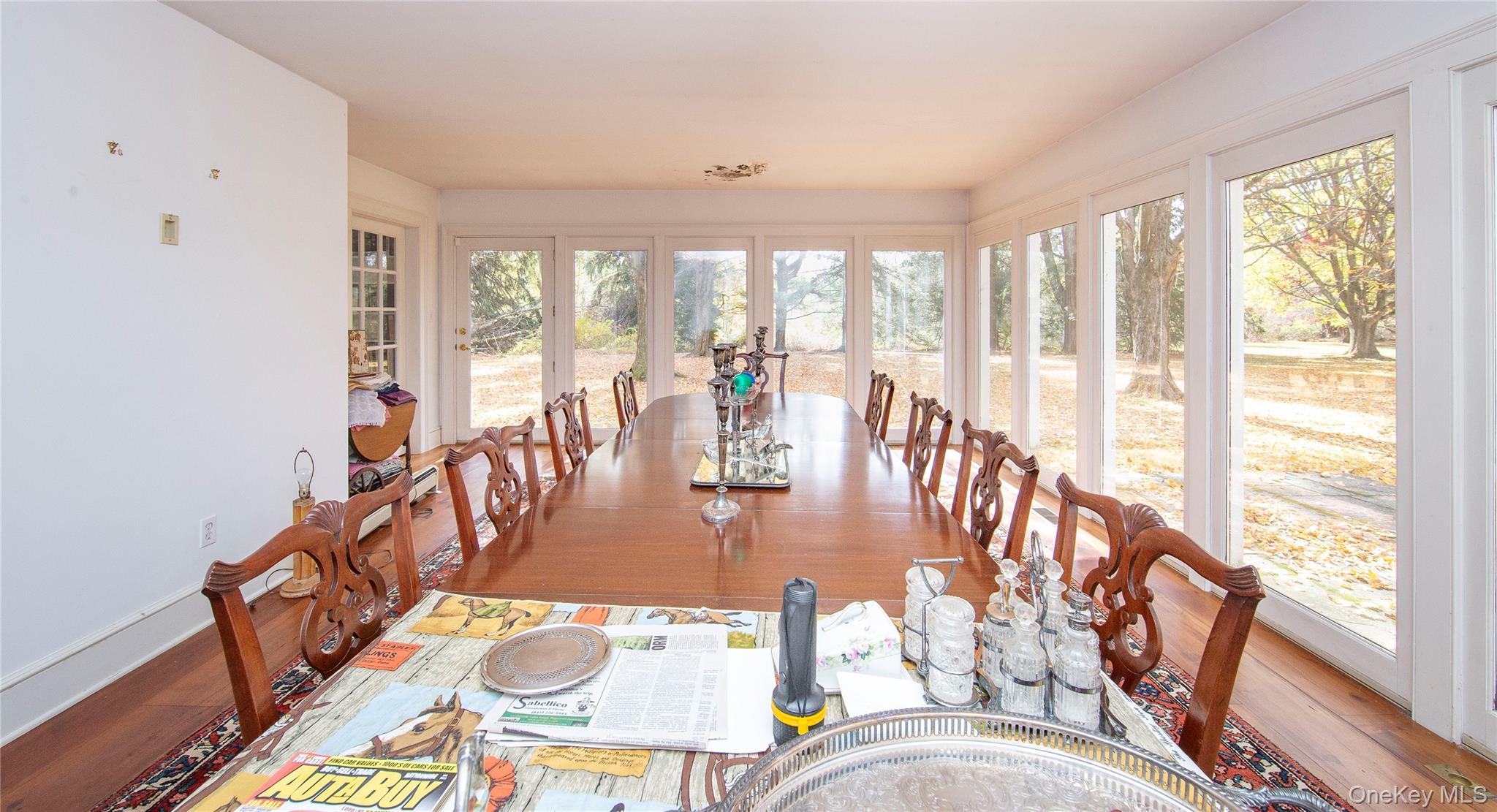 64 South Quaker Hill Road Pawling, NY 12564 - Photo 28 of 46 a dining room with furniture water view and large windows