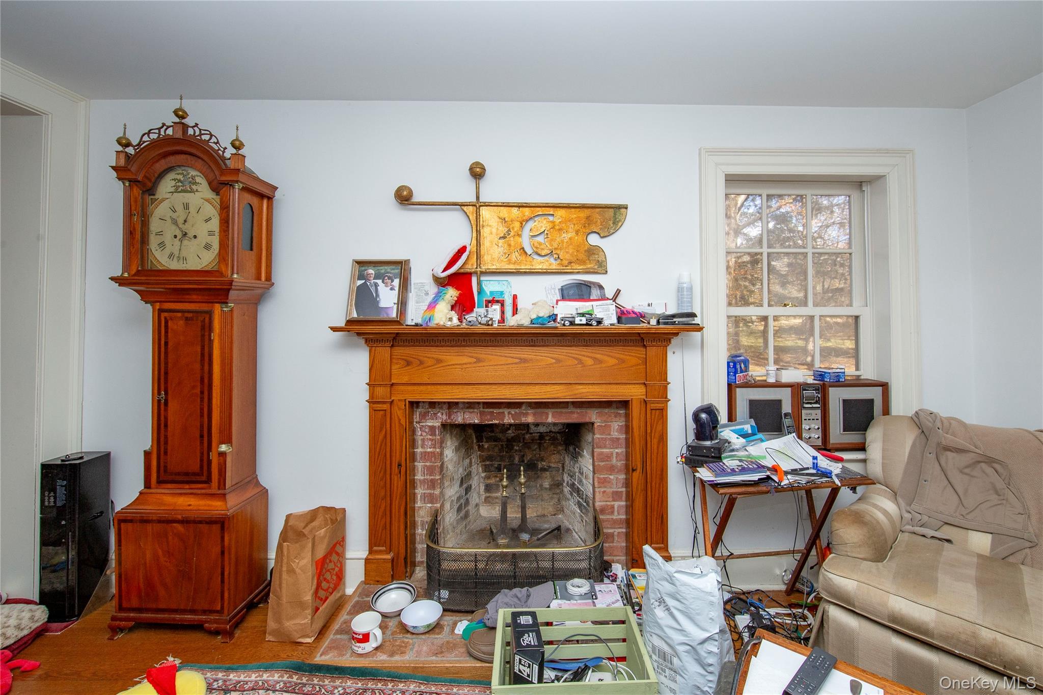 64 South Quaker Hill Road Pawling, NY 12564 - Photo 30 of 46 a living room with furniture a fireplace and a window