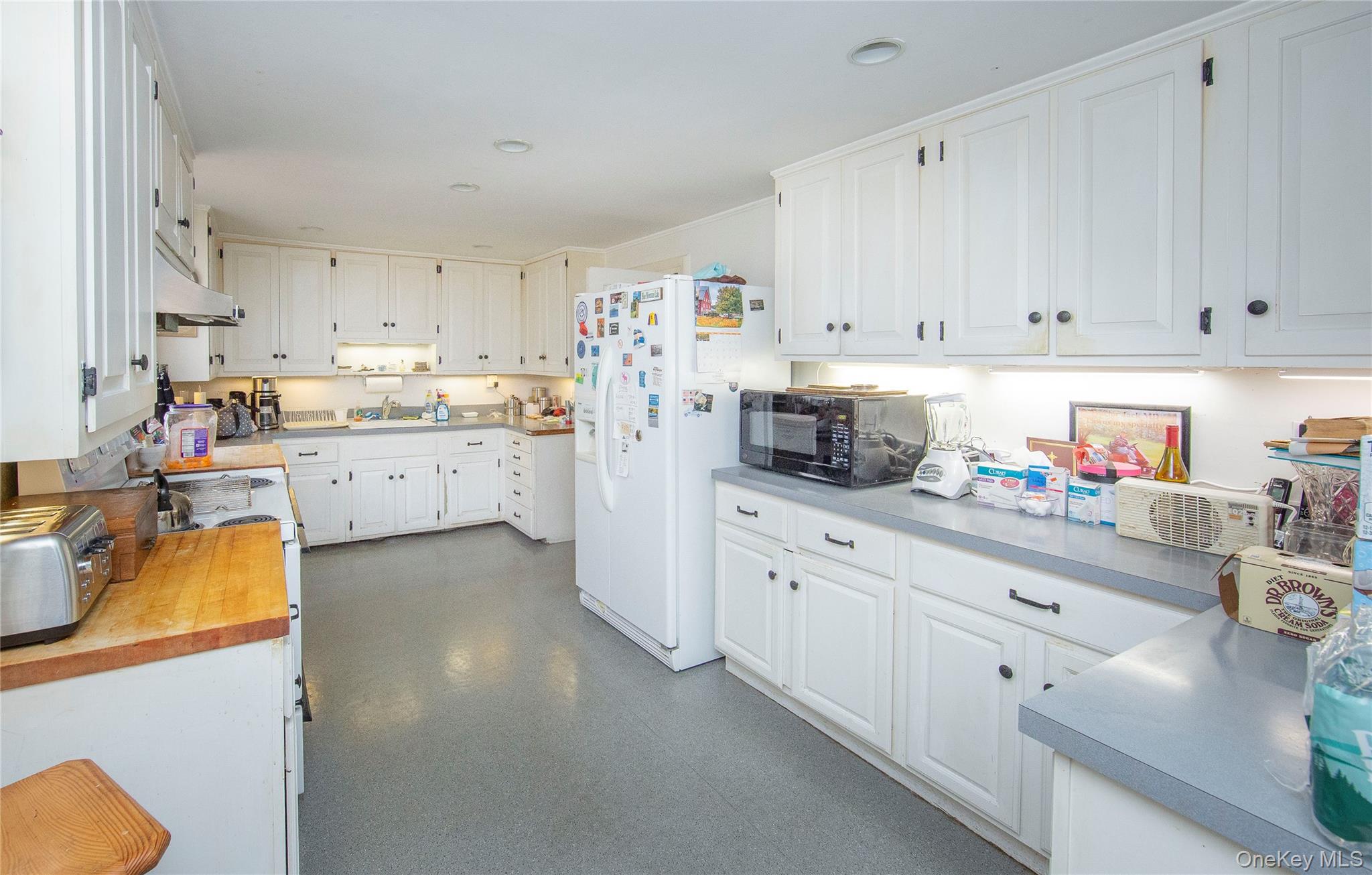 64 South Quaker Hill Road Pawling, NY 12564 - Photo 35 of 46 a kitchen with cabinets appliances and a counter top space