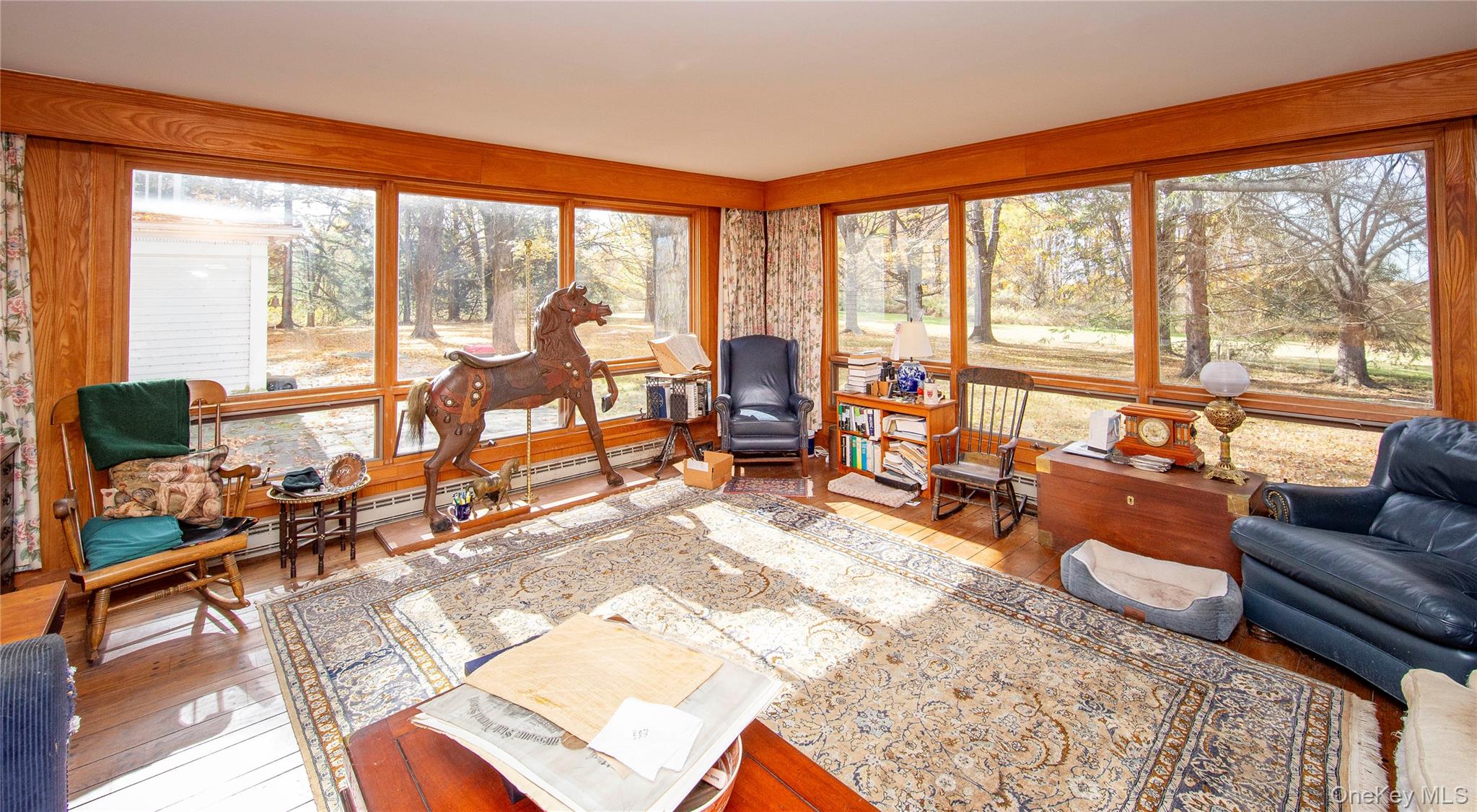 64 South Quaker Hill Road Pawling, NY 12564 - Photo 39 of 46 a view of a livingroom with furniture and floor to ceiling windows