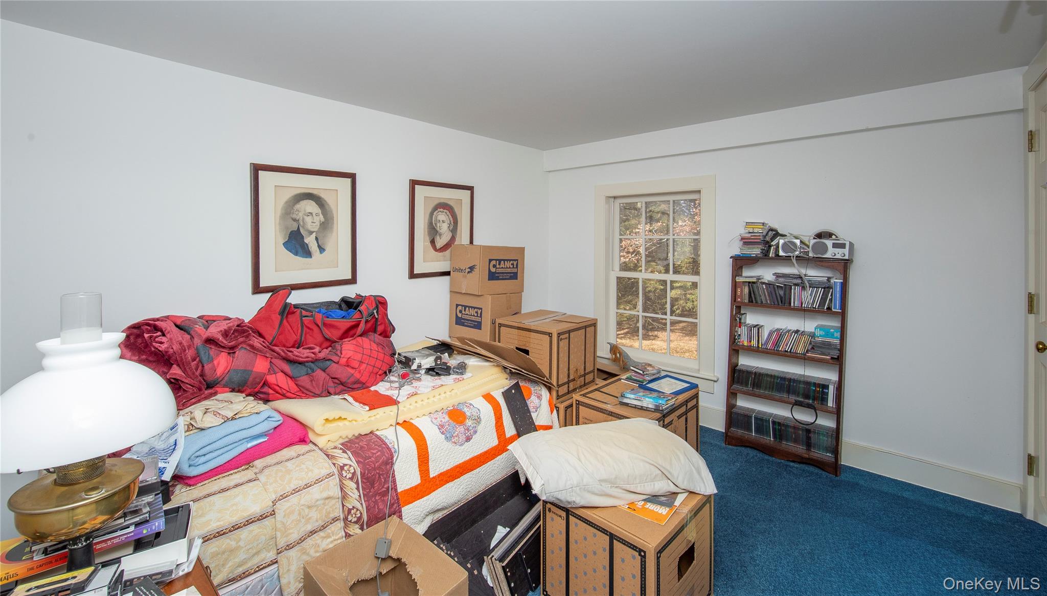 64 South Quaker Hill Road Pawling, NY 12564 - Photo 40 of 46 a bedroom with a bed and a bookshelf