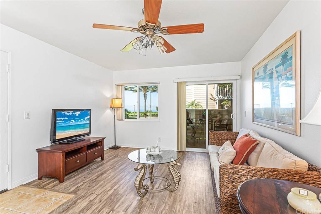 34006 Selva Road, Unit 392 Dana Point, CA 92629 - Photo 24 of 38 Living room area with previous furniture displayed.