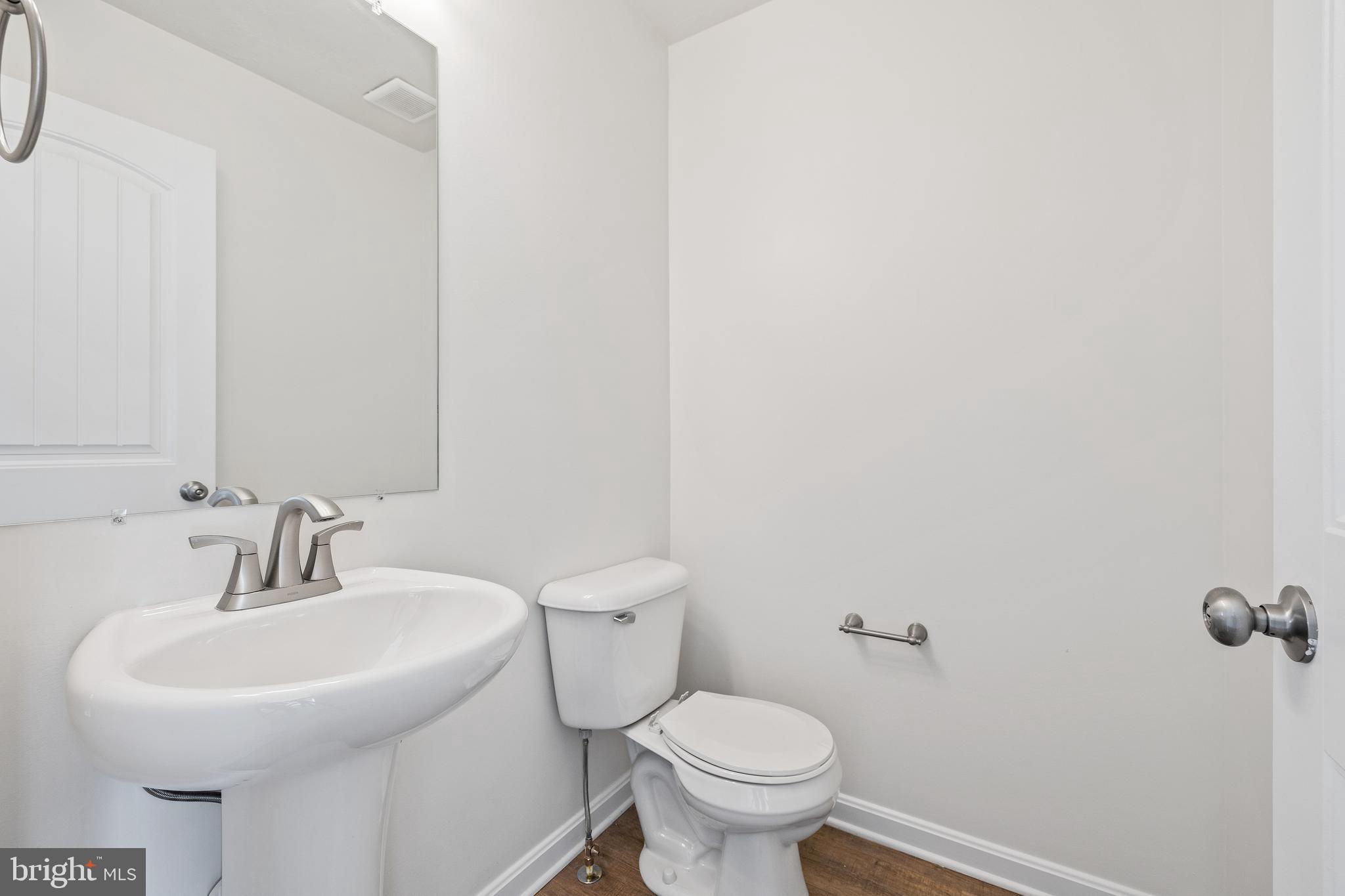 0 H Street, Unit 108 Carlisle, PA 17013 - Photo 13 of 26 a bathroom with a sink and a toilet