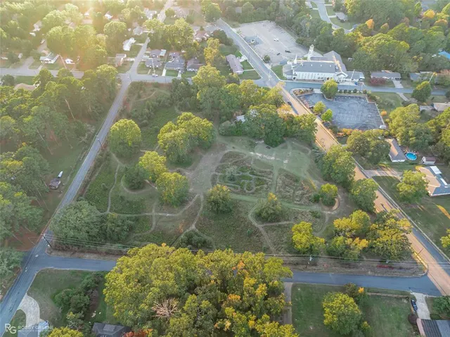 a view of swimming pool from a balcony