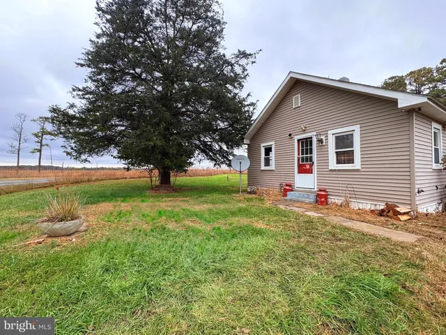 a house view with a garden space