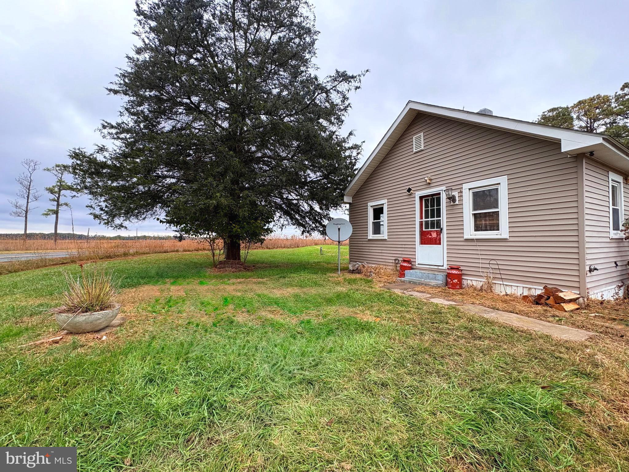 2145 Farm Creek Road Wingate, MD 21675 - Photo 13 of 24 a house view with a garden space