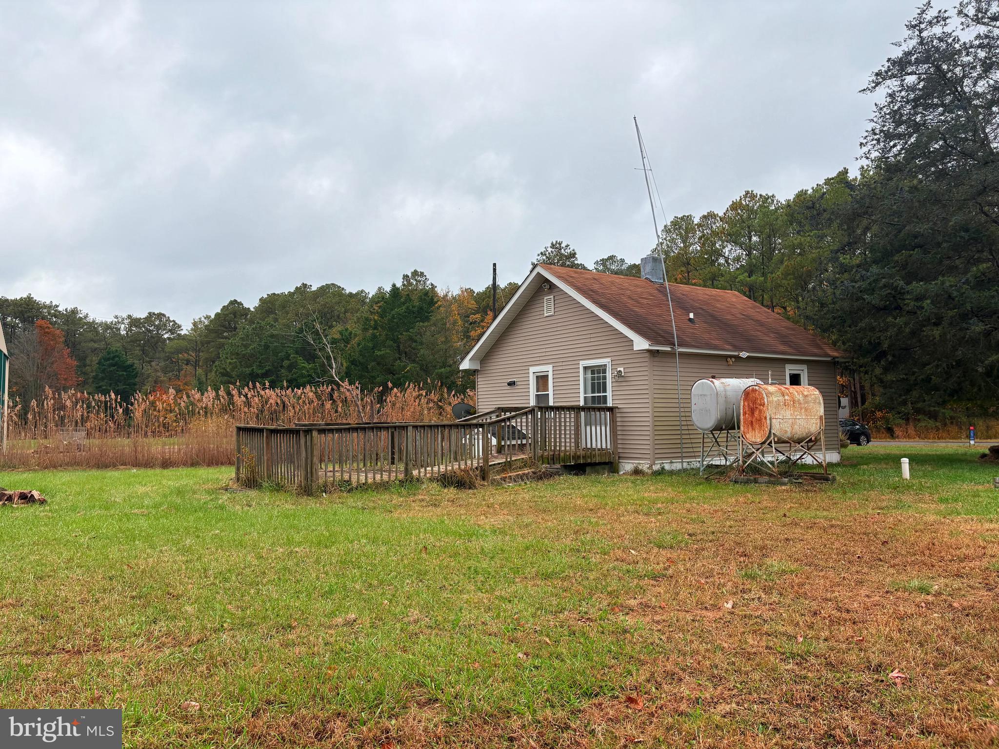 2145 Farm Creek Road Wingate, MD 21675 - Photo 16 of 24 a view of a house with a yard and sitting area