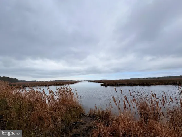 a view of a lake and a mountain view in back