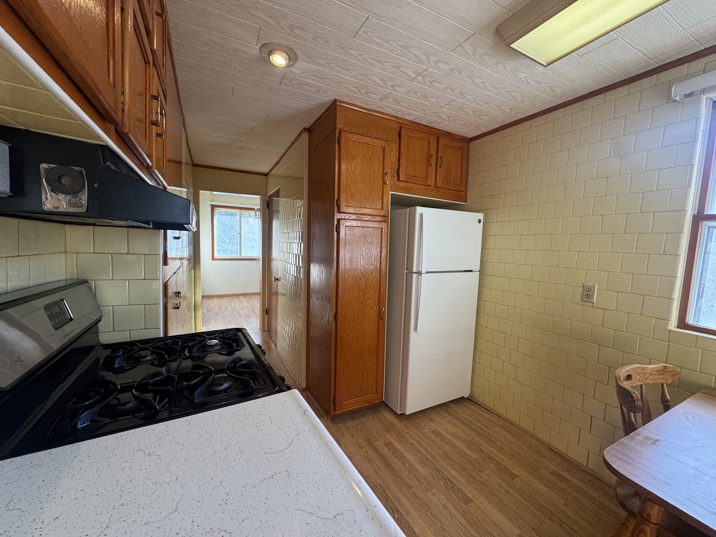 198 West Burlington Street Riverside, IL 60546 - Photo 12 of 19 a kitchen with stainless steel appliances granite countertop a refrigerator and a stove