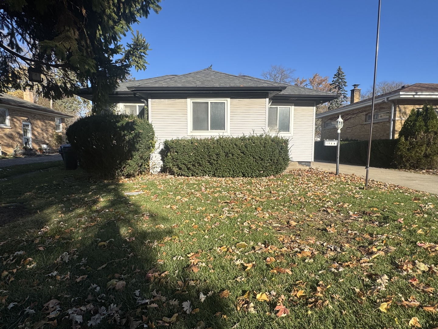198 West Burlington Street Riverside, IL 60546 - Photo 2 of 19 a front view of a house with a yard