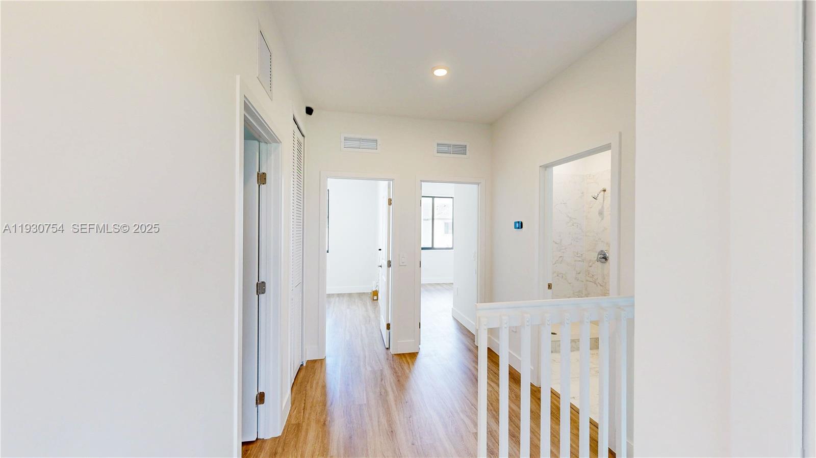 18936 Southwest 344th Terrace Homestead, FL 33034 - Photo 23 of 83 a view of a hallway with wooden floor and staircase