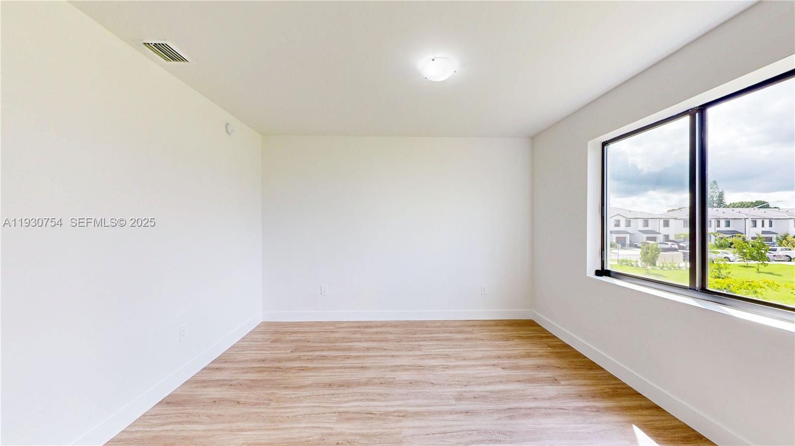 18936 Southwest 344th Terrace Homestead, FL 33034 - Photo 31 of 83 a view of an empty room and window