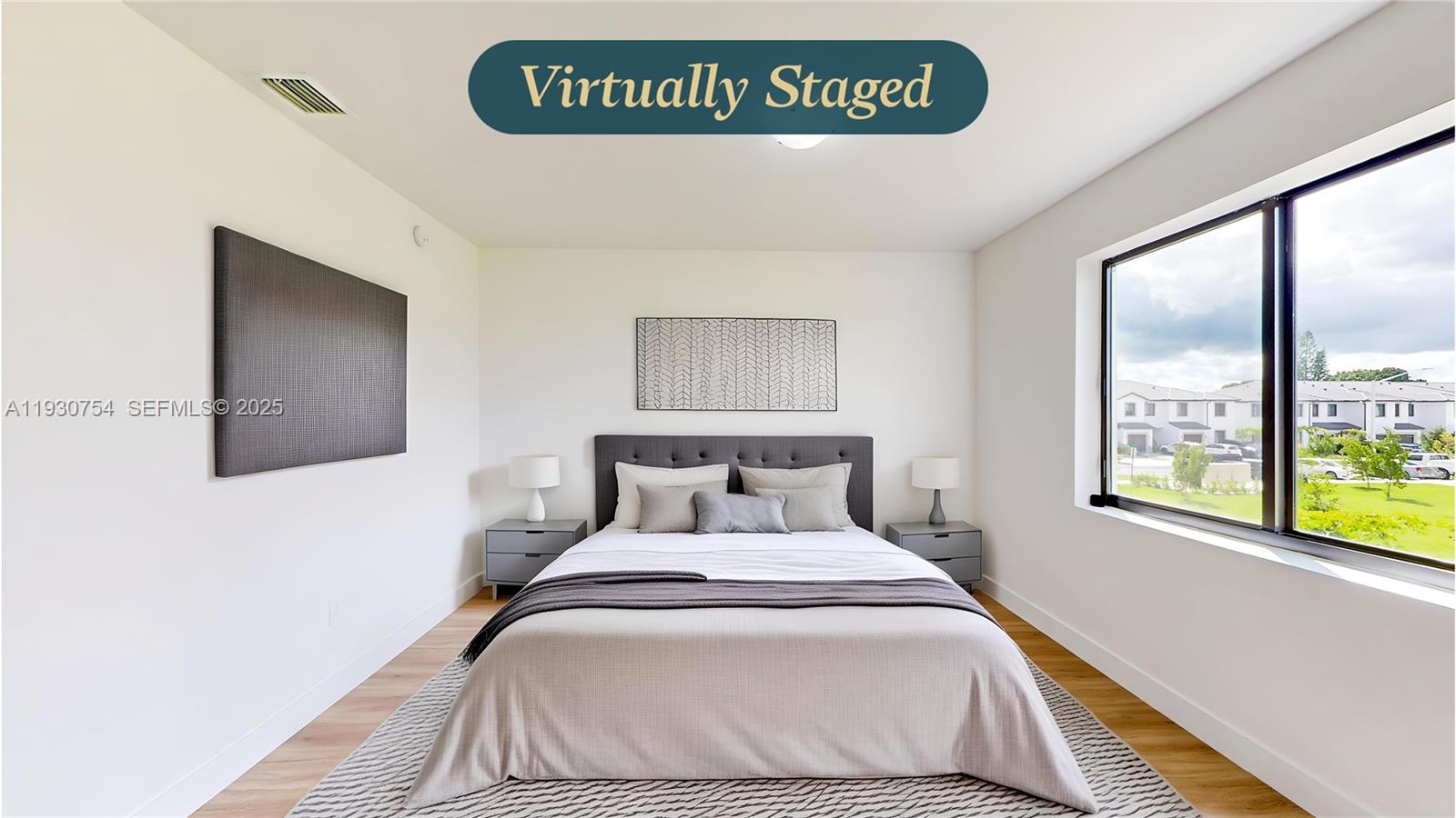 18936 Southwest 344th Terrace Homestead, FL 33034 - Photo 32 of 83 a bedroom with a bed and a large window