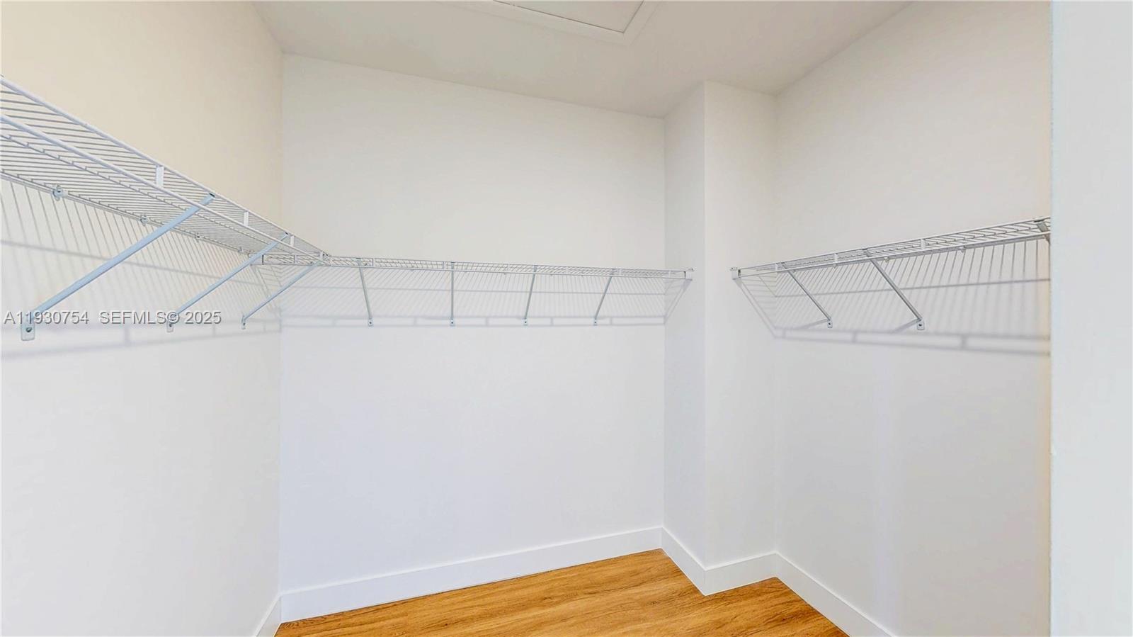 18936 Southwest 344th Terrace Homestead, FL 33034 - Photo 35 of 83 a view of a room with racks on the wall