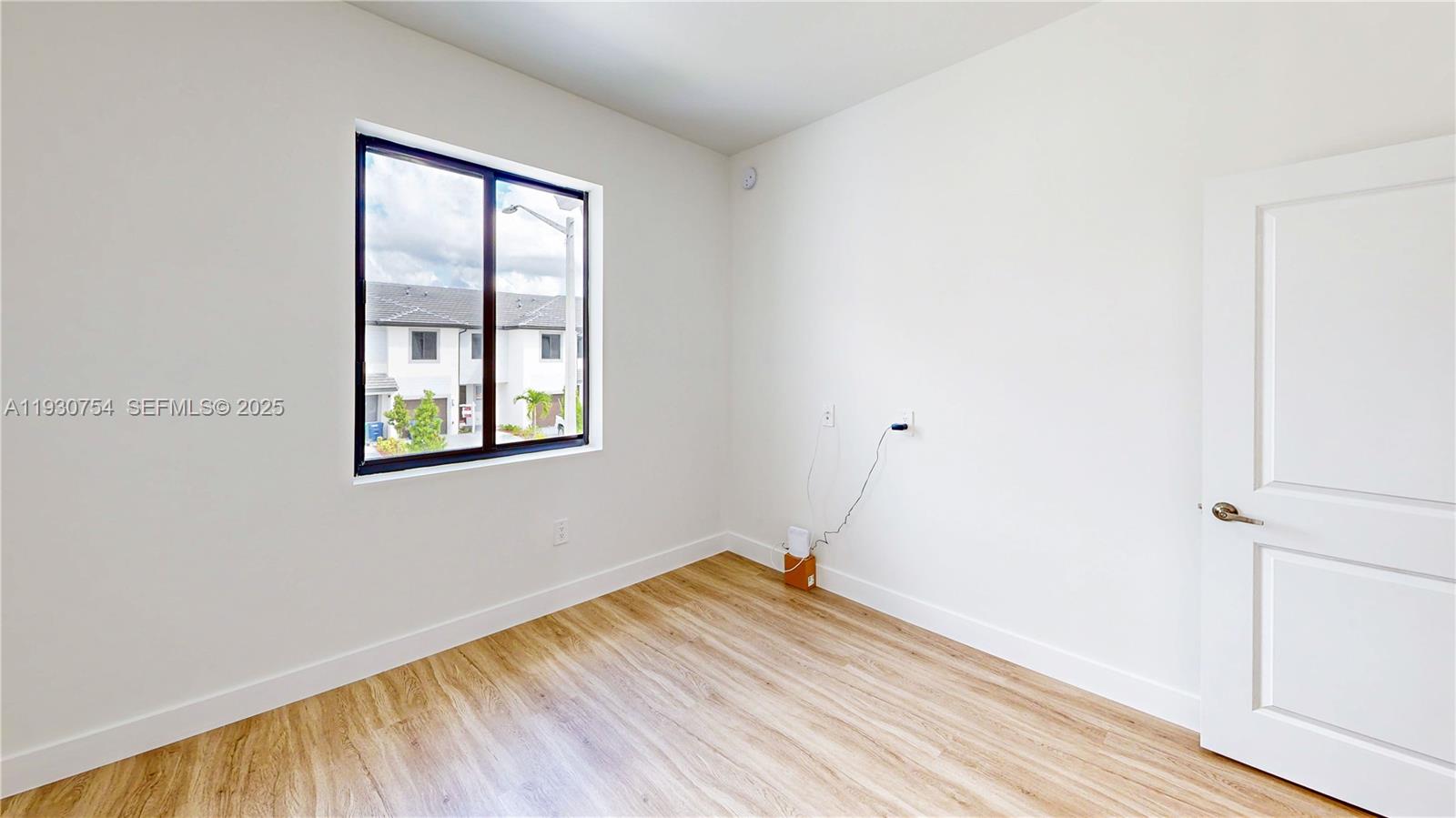 18936 Southwest 344th Terrace Homestead, FL 33034 - Photo 36 of 83 an empty room with a window