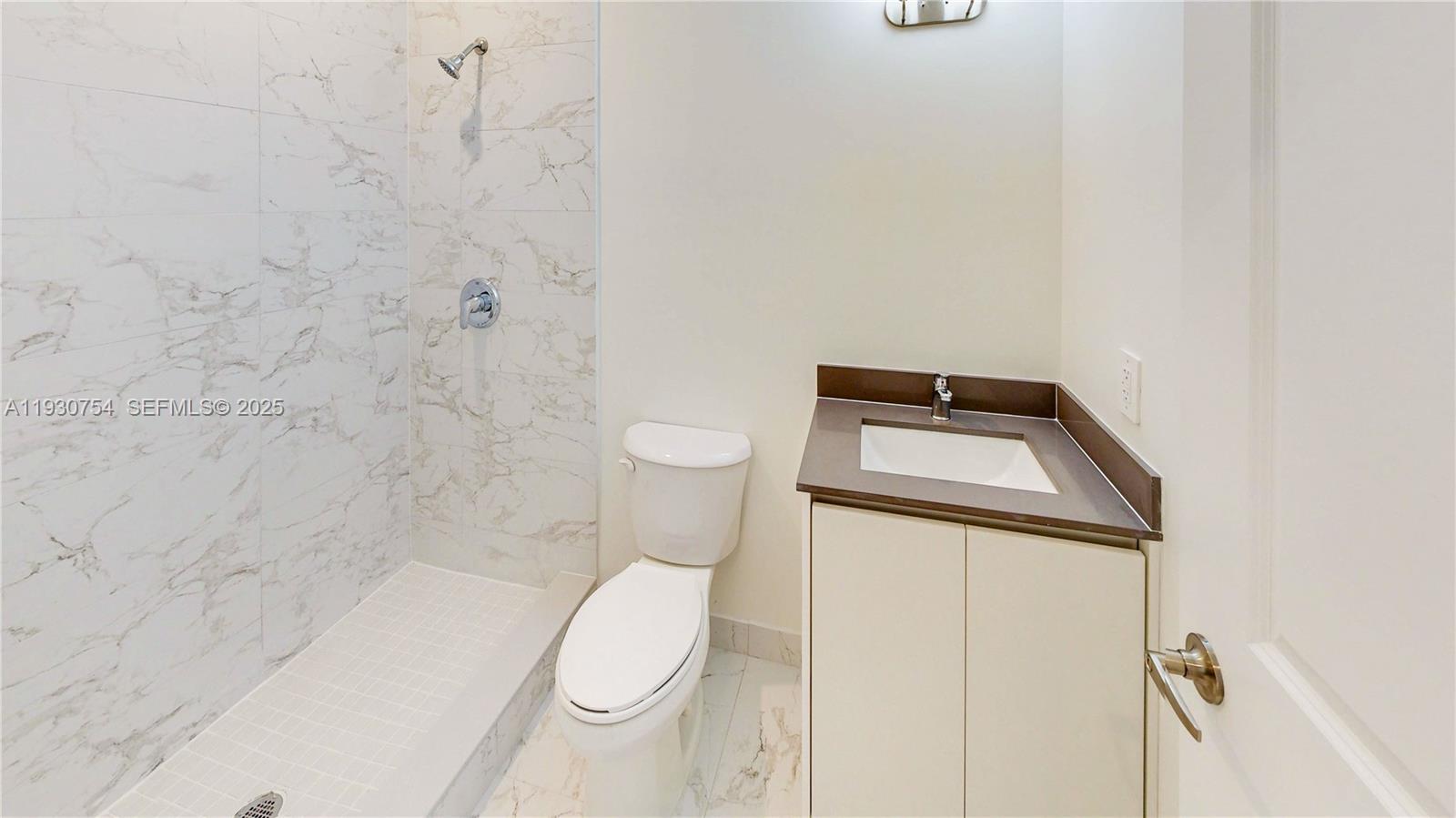 18936 Southwest 344th Terrace Homestead, FL 33034 - Photo 45 of 83 a white toilet sitting next to a white sink