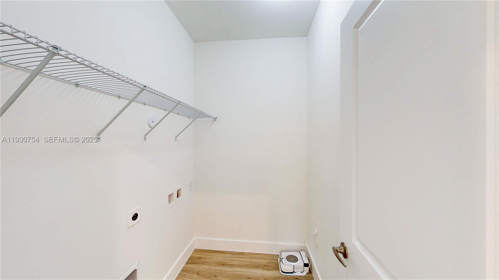 18936 Southwest 344th Terrace Homestead, FL 33034 - Photo 47 of 83 a view of a room with racks on the wall