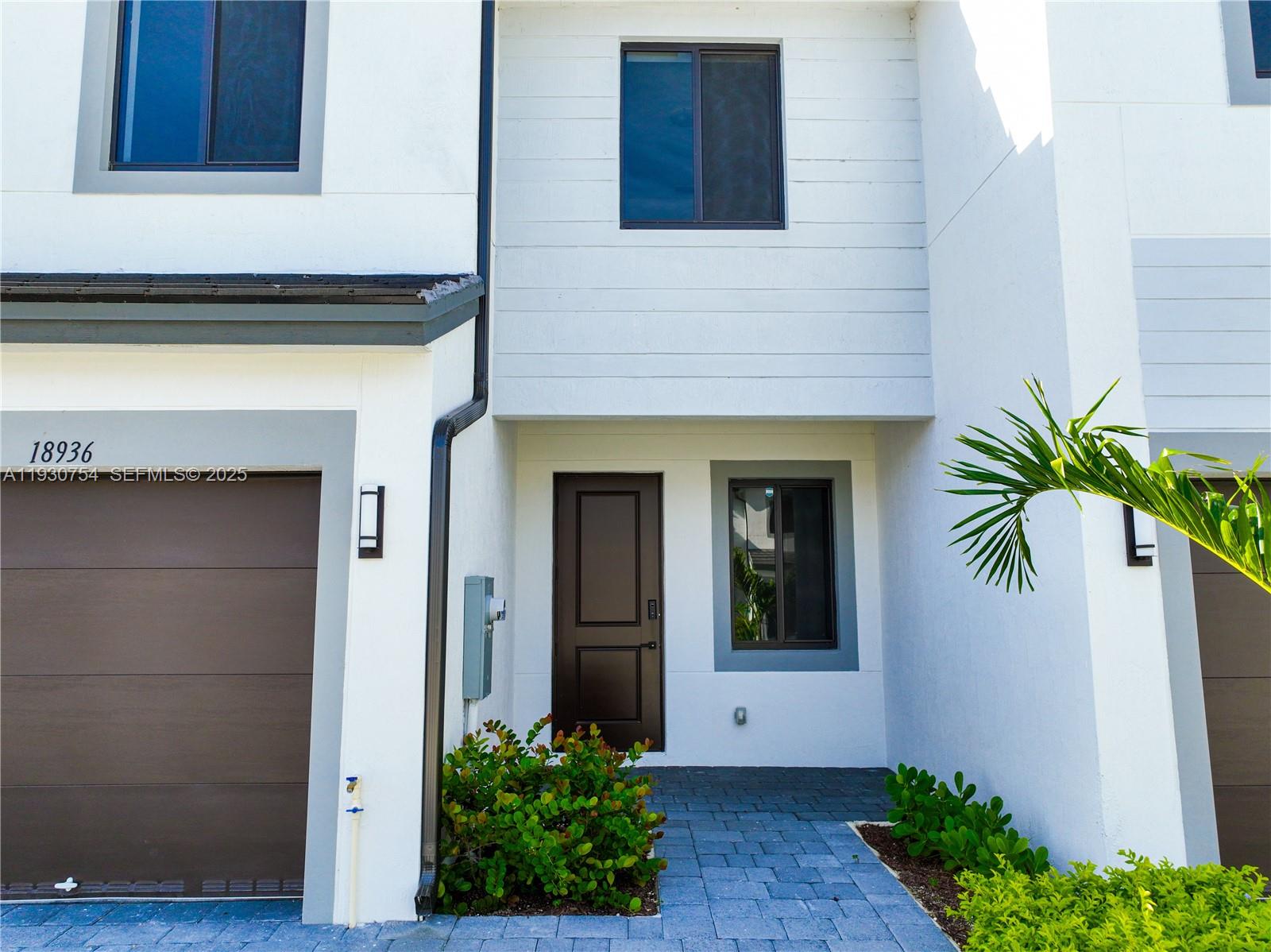 18936 Southwest 344th Terrace Homestead, FL 33034 - Photo 61 of 83 a front view of a house with a yard