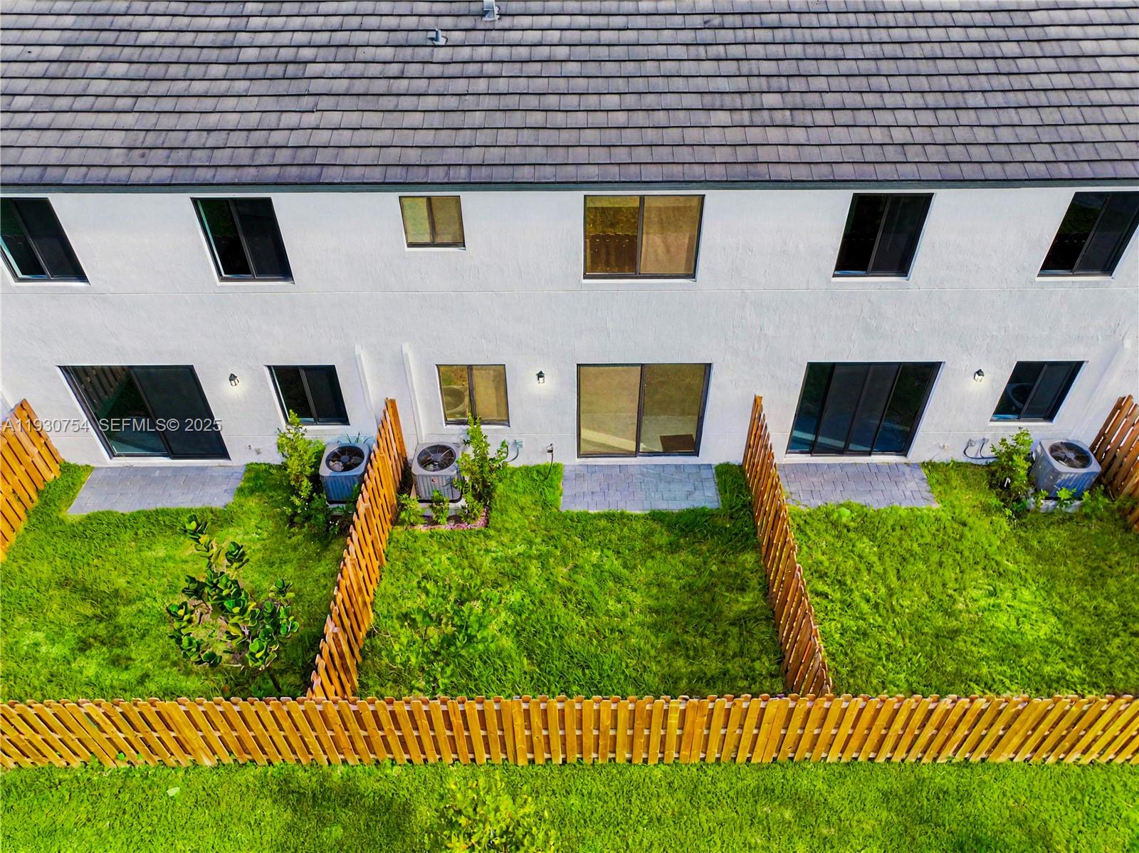18936 Southwest 344th Terrace Homestead, FL 33034 - Photo 62 of 83 a view of backyard with plants and outdoor seating