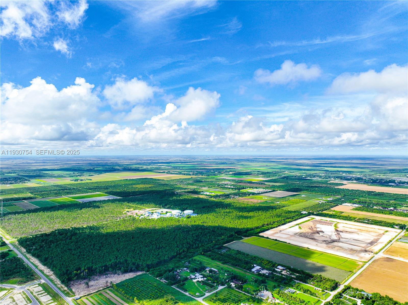18936 Southwest 344th Terrace Homestead, FL 33034 - Photo 75 of 83 a view of a big yard with table and chairs