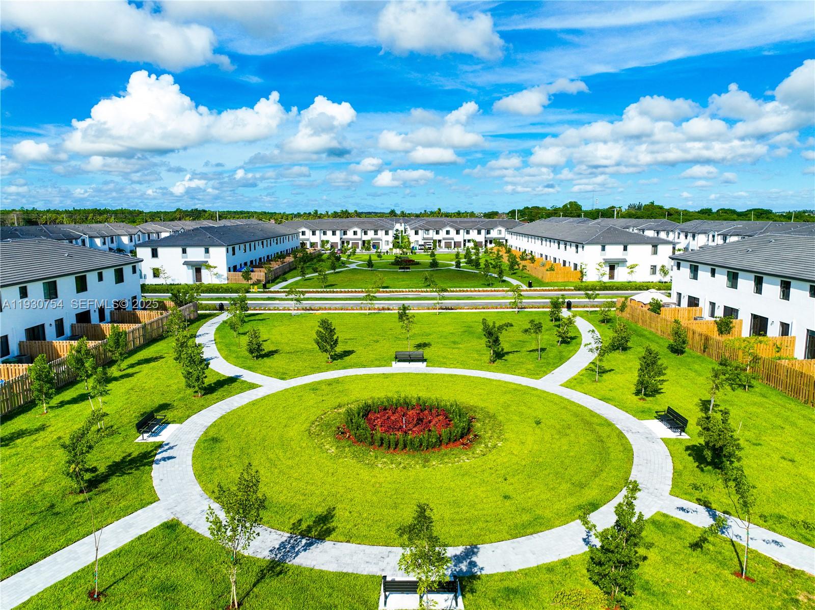 18936 Southwest 344th Terrace Homestead, FL 33034 - Photo 76 of 83 a view of a swimming pool with a table and chairs
