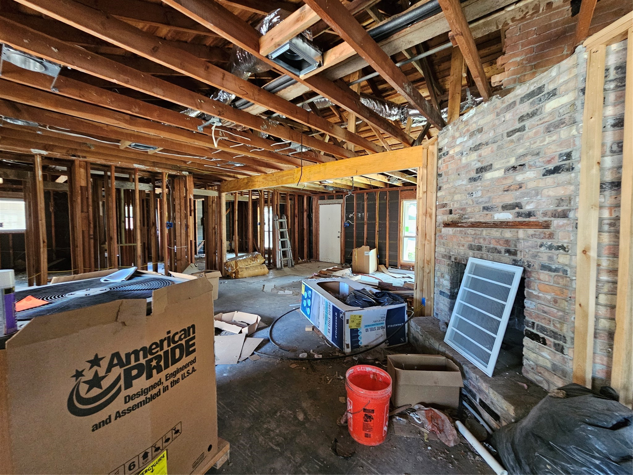 5706 Rutherglenn Drive Houston, TX 77096 - Photo 12 of 45 a view of a patio with table and chairs with wooden floor and fence