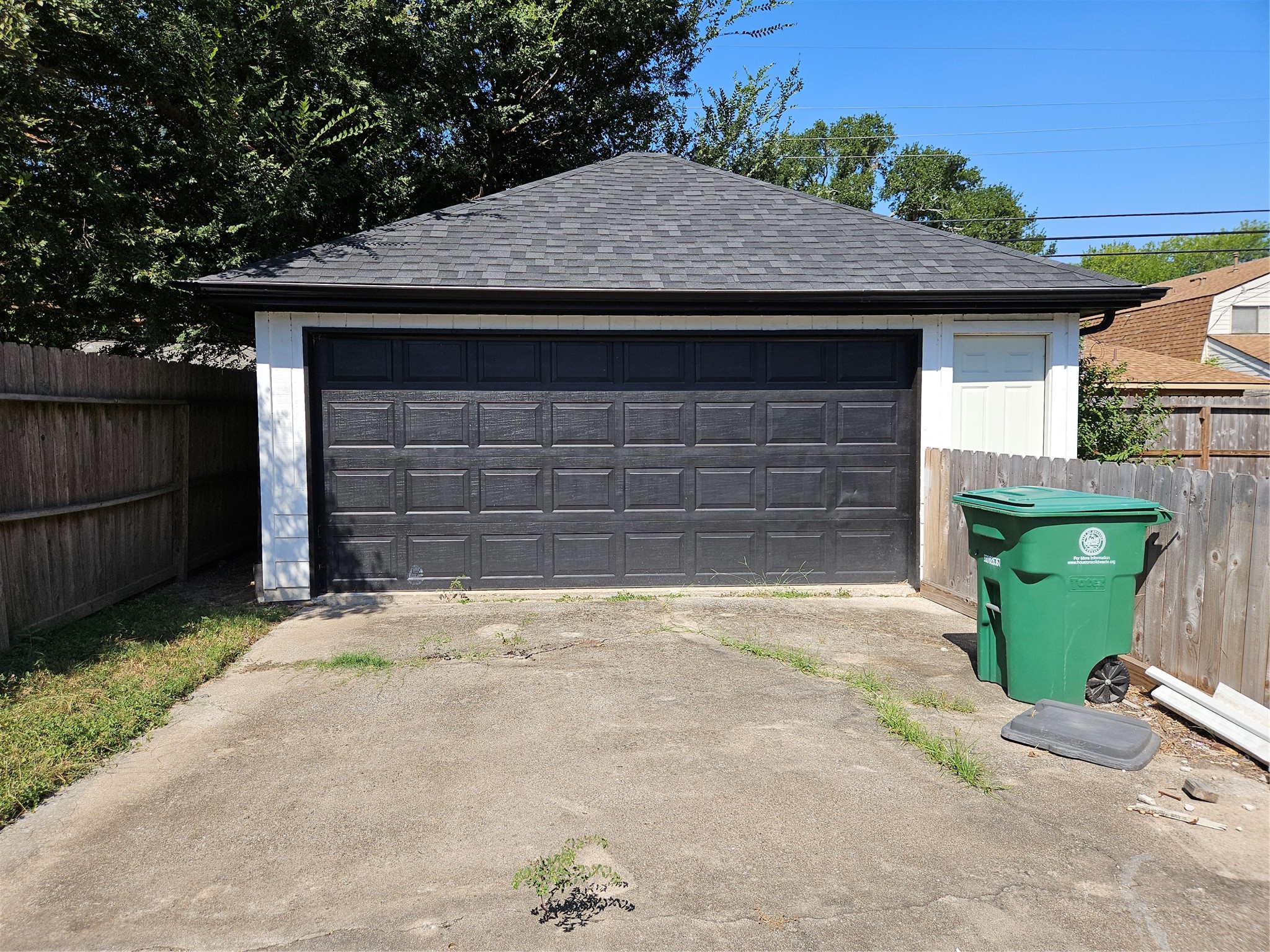 5706 Rutherglenn Drive Houston, TX 77096 - Photo 39 of 45 a front view of a house with a garage