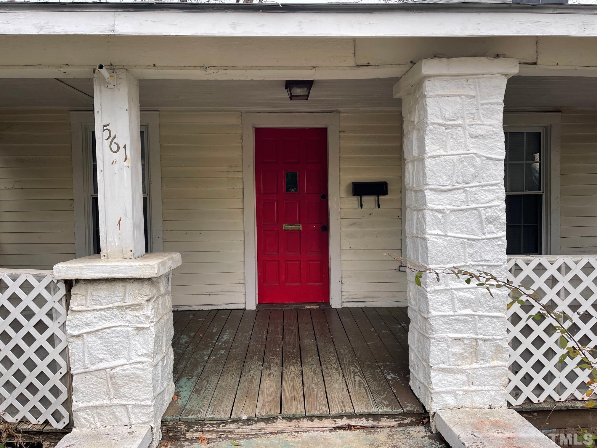 561 New Bern Avenue Raleigh, NC 27601 - Photo 2 of 15 a front view of a house with entryway