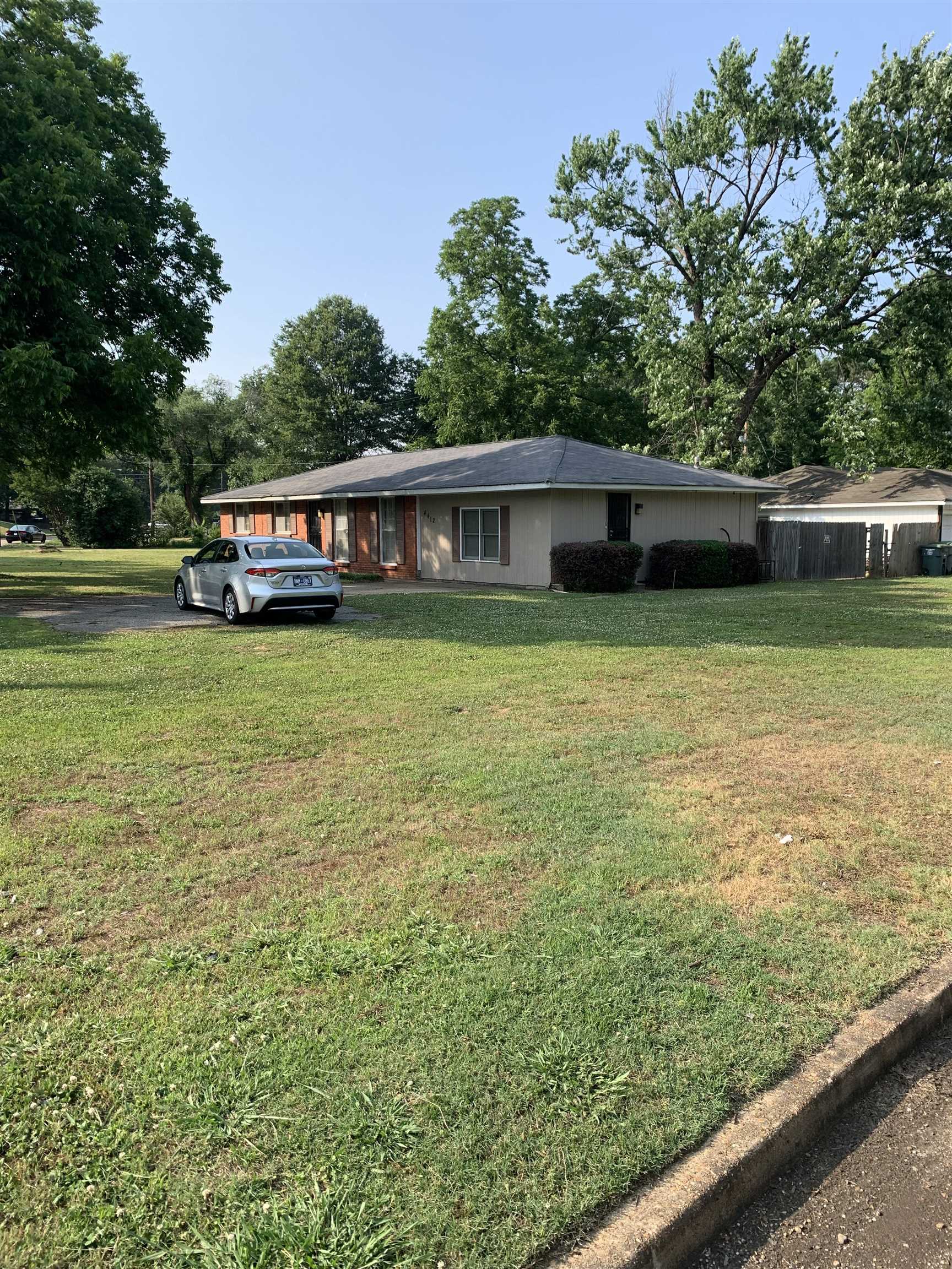 4412 Millbranch Road Memphis, TN 38116 - Photo 3 of 15 a house with a yard