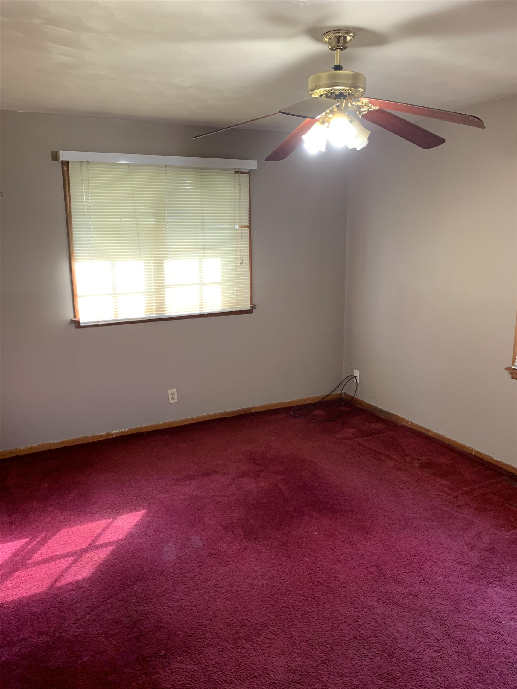 4412 Millbranch Road Memphis, TN 38116 - Photo 8 of 15 an empty room with a window