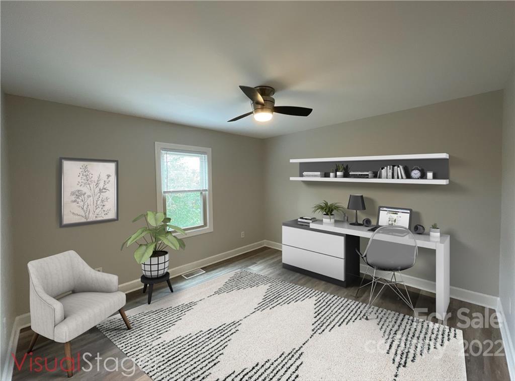 707 Grandin Road Charlotte, NC 28208 - Photo 17 of 19 a living room with furniture and a potted plant