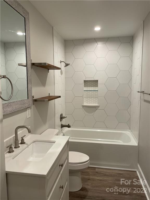 707 Grandin Road Charlotte, NC 28208 - Photo 19 of 19 a bathroom with a sink toilet and shower