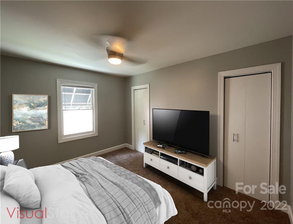 707 Grandin Road Charlotte, NC 28208 - Photo 6 of 19 a bedroom with bed and flat screen tv