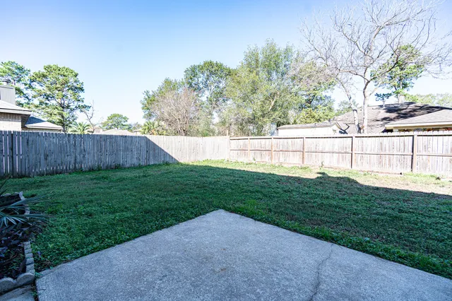 a view of a backyard with a garden