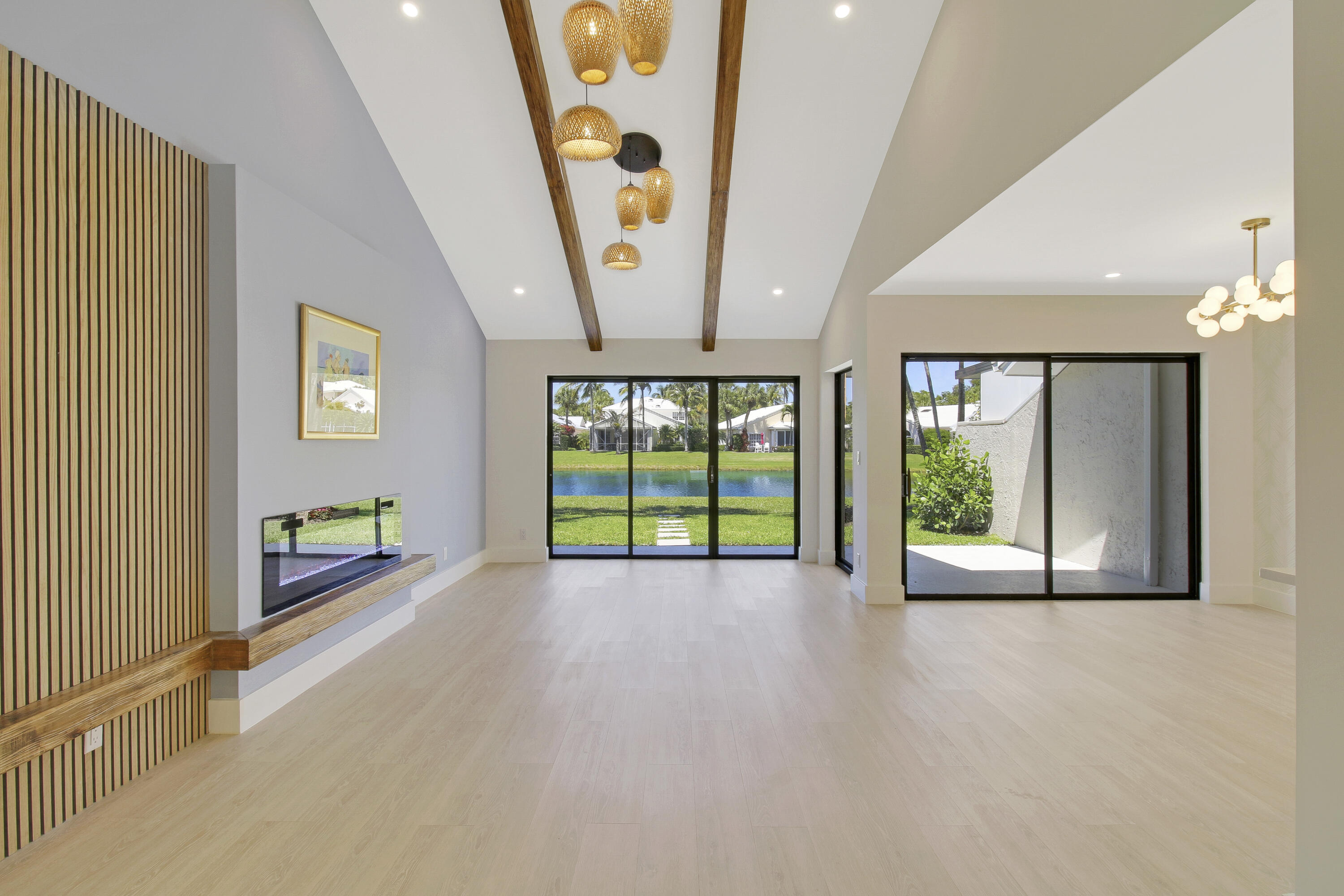 3703 Cape Pointe Circle Jupiter, FL 33477 - Photo 4 of 55 a view of an empty room with a window